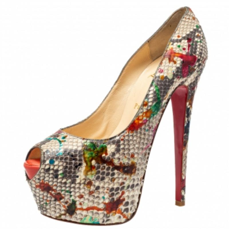 Strike a bold finish to your party outfit wearing these stunning Christian Louboutin Highness pumps. Crafted with multicolor python leather, they feature an impressive peep-toe silhouette. The leather-lined insoles carry brand labeling and the pair