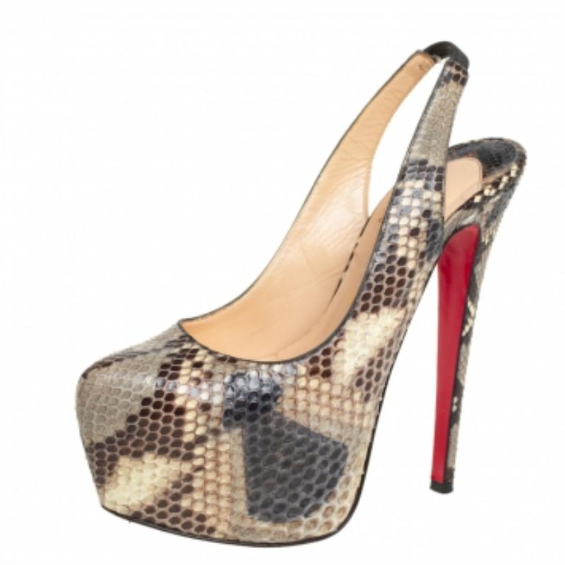 Take your love for Louboutins to new heights by adding this gorgeous Daffodile pair to your collection. The pumps speak of high fashion in every stitch and curve. The exterior is made from python and is finished with concealed chunky platforms,