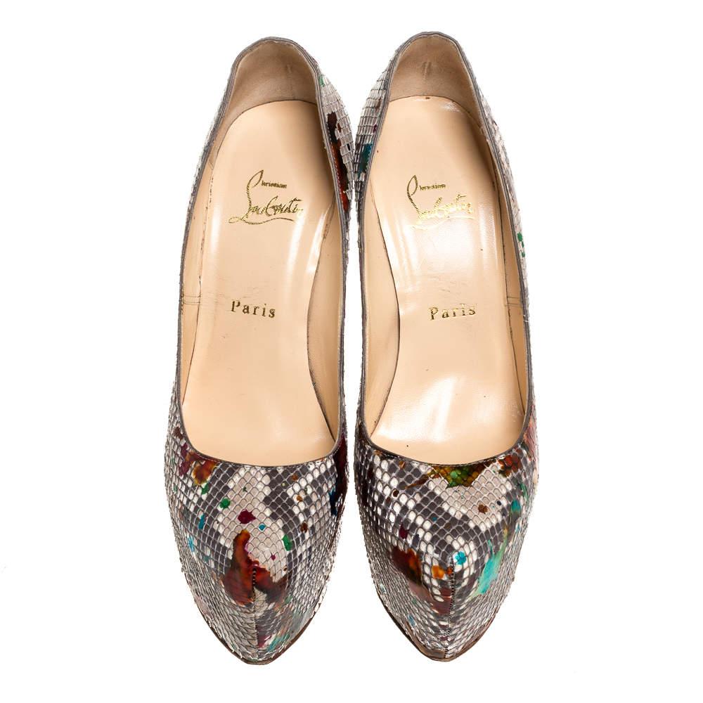 Take your love for Louboutins to new heights by adding this gorgeous pair to your collection. The pumps simply speak high fashion in every stitch and curve. The exteriors come made from python leather and the pumps are finished with platforms, 15.5