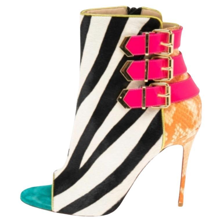 Christian Louboutin - Bottines en cuir de veau imprimé triboclou, taille 37 en vente
