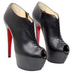 Christian Louboutin Recouzetta in vernice nera