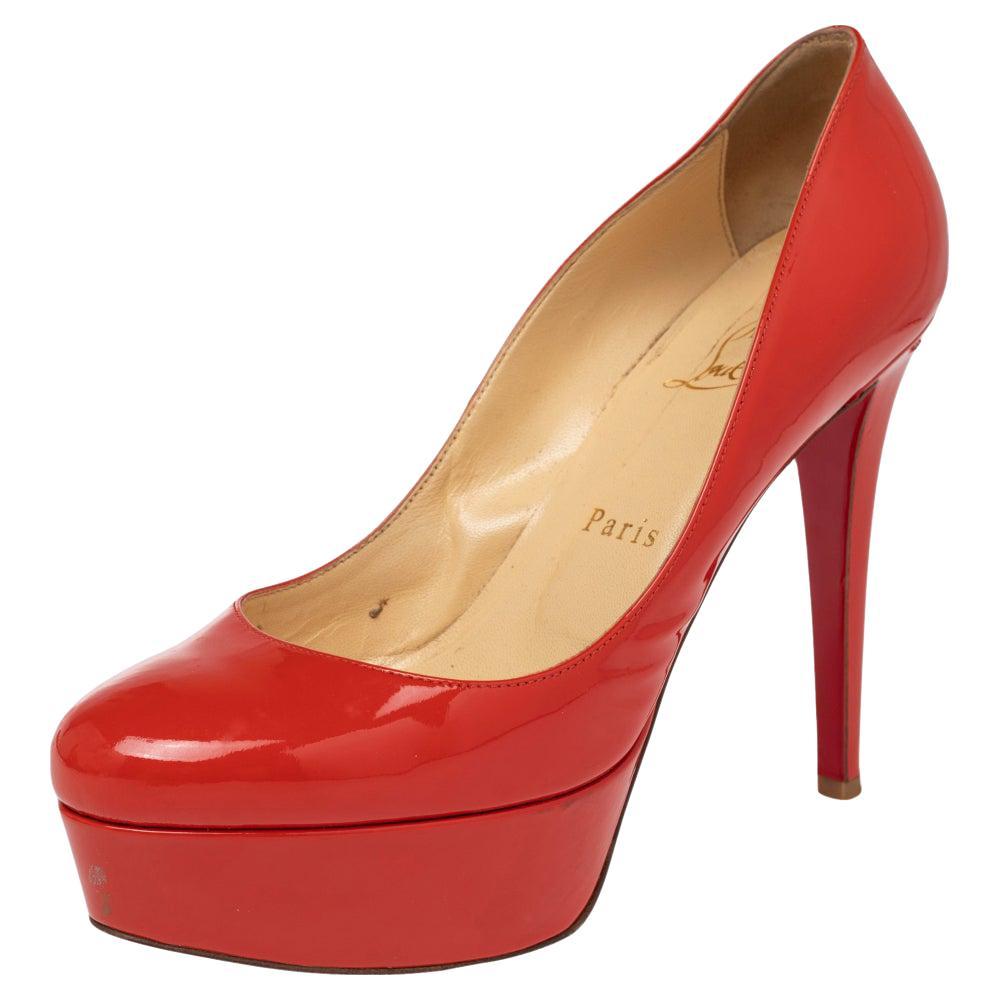 red patent leather open toe pumps