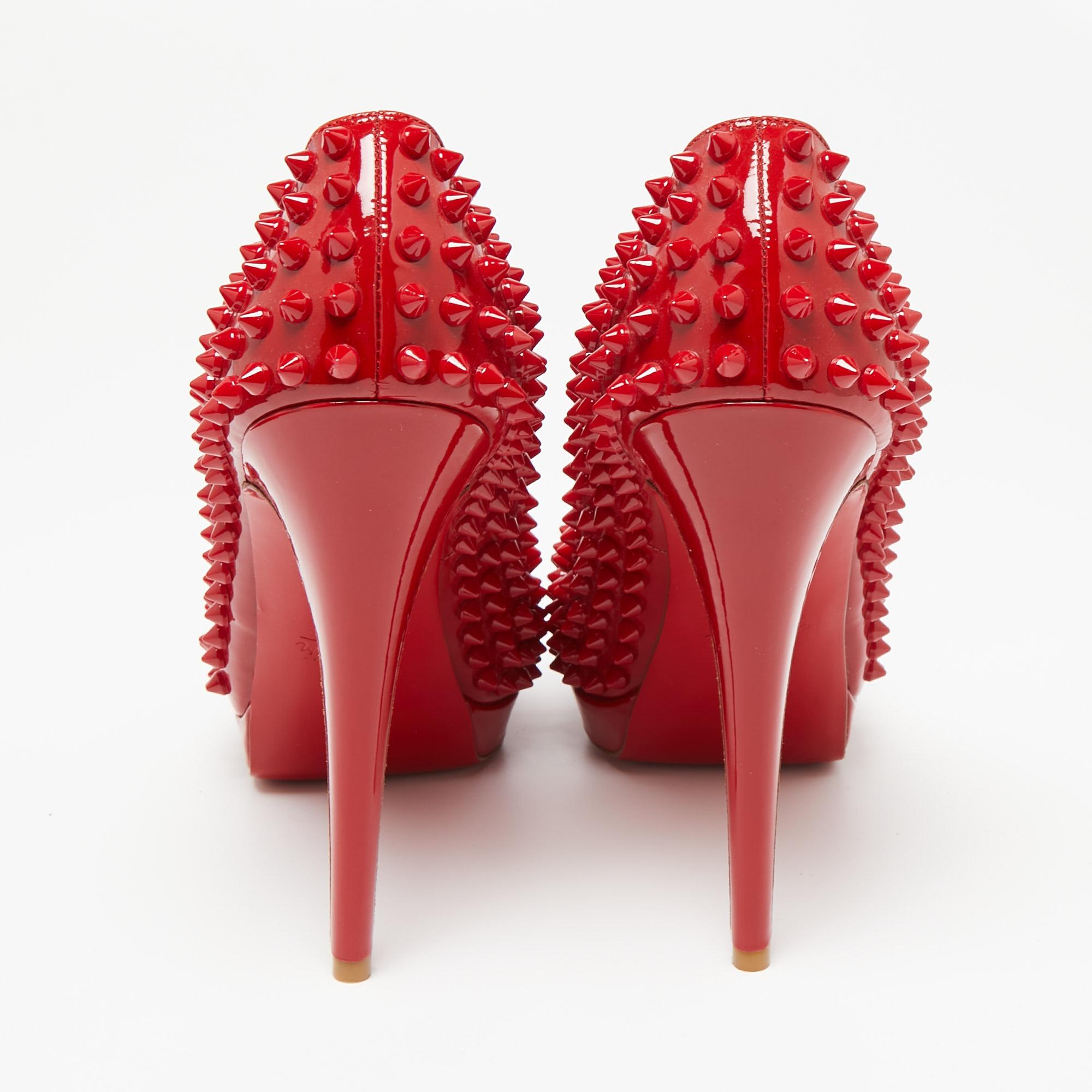 red spike shoes
