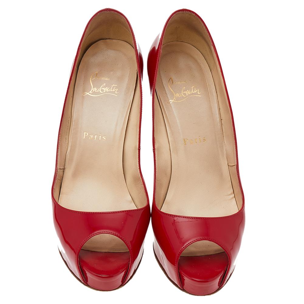 Christian Louboutin's Very Prive pumps exude a timeless and sophisticated appeal that works well with formal and casual outfits. Crafted from patent leather in a red shade, they feature peep toes and are elevated on 12 cm stiletto heels supported by