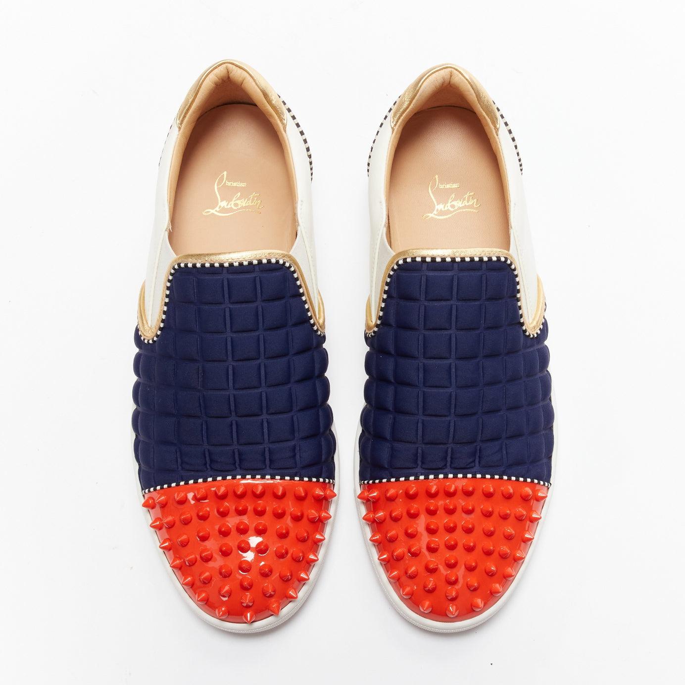 CHRISTIAN LOUBOUTIN red patent spike toe low top skate sneaker EU42
Reference: JSLE/A00090
Brand: Christian Louboutin
Material: Fabric, Leather
Color: Red, Navy
Pattern: Solid
Closure: Slip On
Lining: Nude Leather
Extra Details: Black spikes fabric