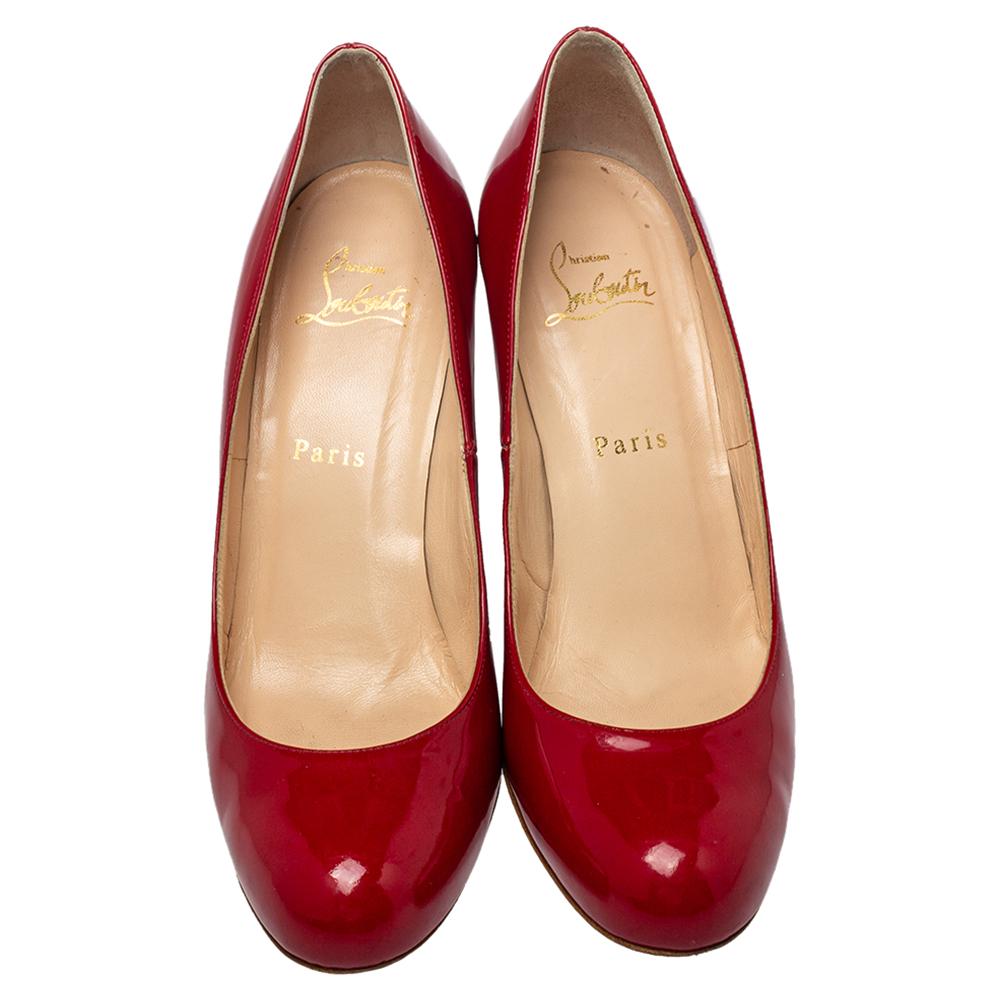 Enhance your look by adding these red Christian Louboutin patent leather wedge pumps to the ensemble and coordinate your handbag with them for an uber-chic style. This shade of red makes a lovely statement piece to heighten your daily outfits or to