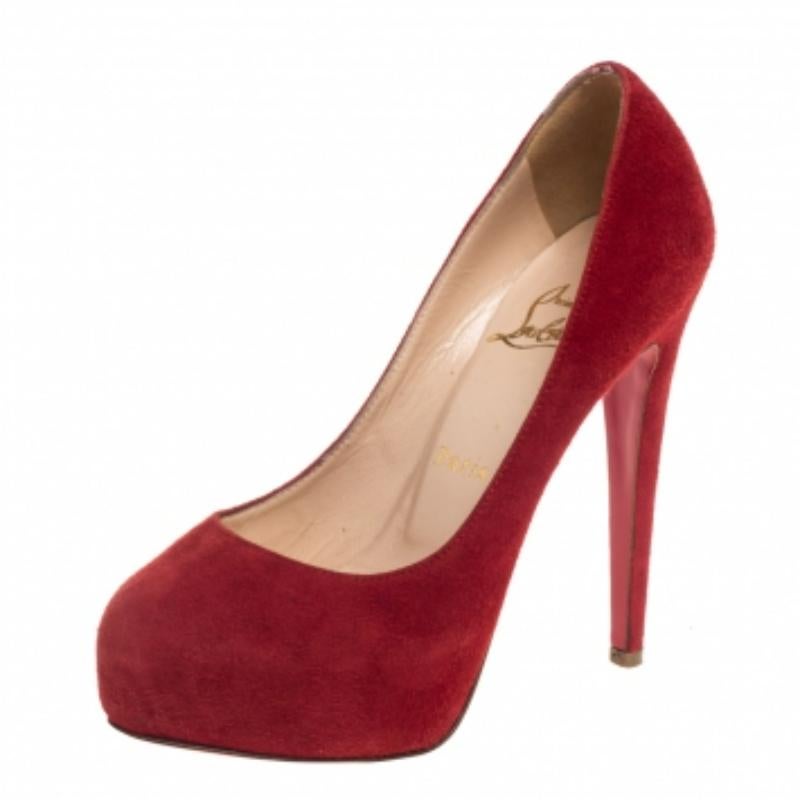 A classic to add to one's shoe collection is this pair. These Christian Louboutin beauties are covered in suede and styled with concealed platforms, 13 cm heels, and the signature red soles. Add them to your closet today and flaunt them with pride!