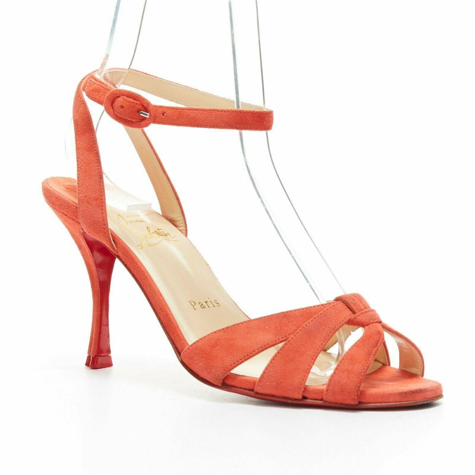 CHRISTIAN LOUBOUTIN red suede strappy ankle strap curved mid heel sandals EU37 
Reference: TGAS/A03348 
Brand: Christian Louboutin 
Designer: Christian Louboutin 
Model: Strappy suede heel 
Material: Suede 
Color: Red 
Pattern: Solid 
Closure: Ankle