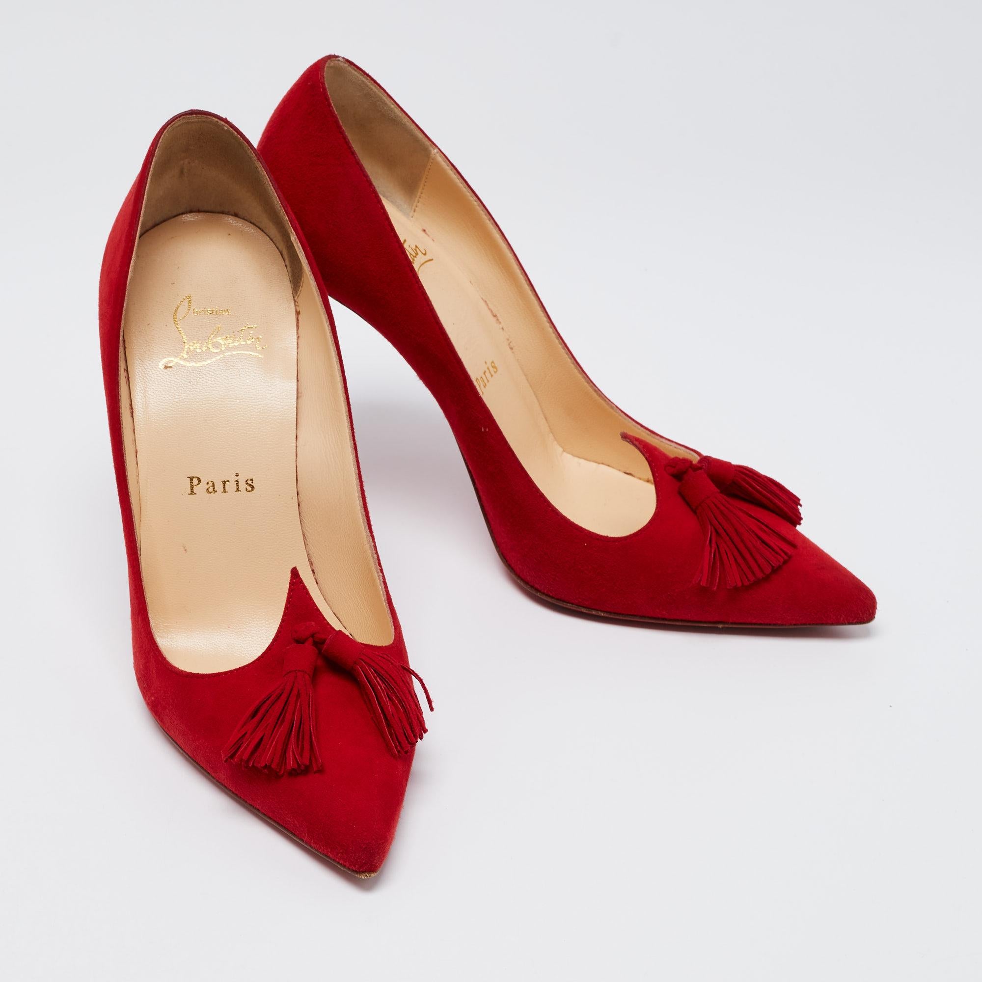 These pointed-toe pumps from Christian Louboutin have come straight from a shoe lover's dream. Crafted from red suede, detailed with tassels, and balanced on 10 cm heels, the pumps are lovely and gorgeous!

