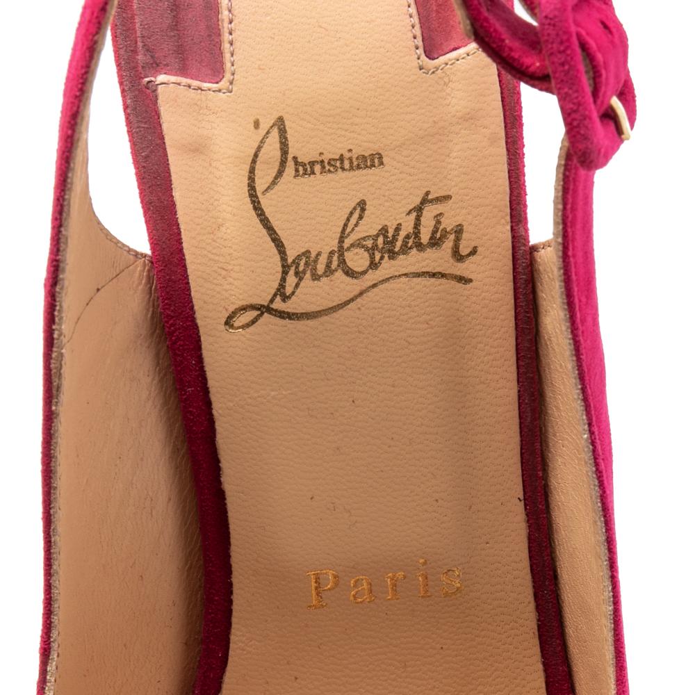 These Christian Louboutin sandals will lend a modern edge to a range of looks in your everyday outfit rotation. Made from suede in a peep-toe silhouette, this pair is heightened by cork wedge heels. They feature adjustable slingback straps for a