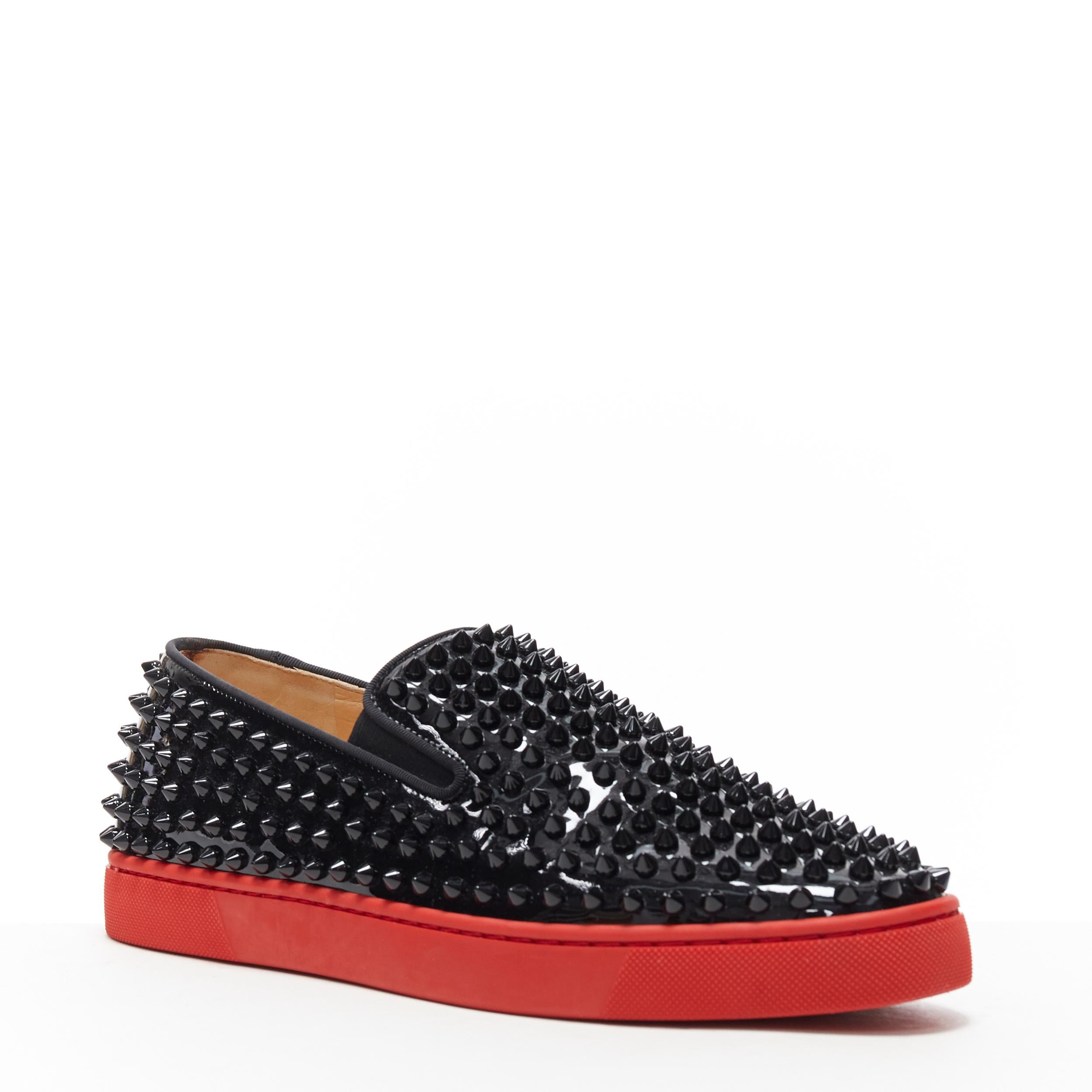 CHRISTIAN LOUBOUTIN Roller Boat black patent spike stud red