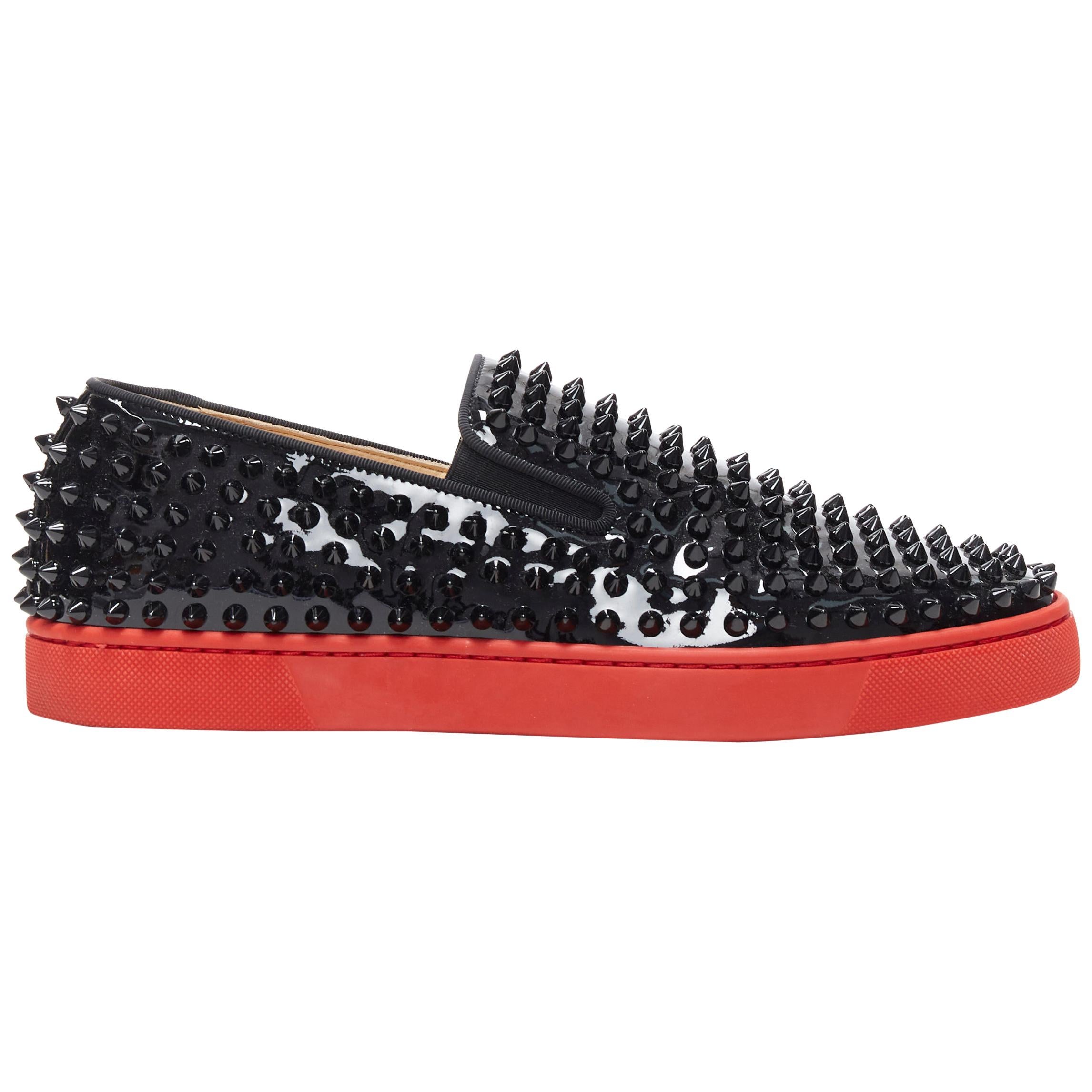 CHRISTIAN LOUBOUTIN Roller Boat black patent spike stud red