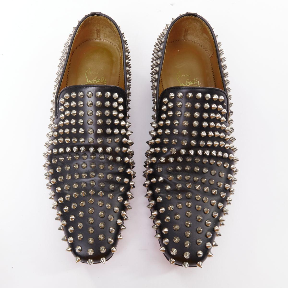 CHRISTIAN LOUBOUTIN Rollerboy black silver leather spike stud loafers EU40.5
Reference: SYYG/A00034
Brand: Christian Louboutin
Model: Rollerboy
Material: Leather
Color: Black, Silver
Pattern: Studded
Closure: Slip On
Lining: Nude Leather
Made in:
