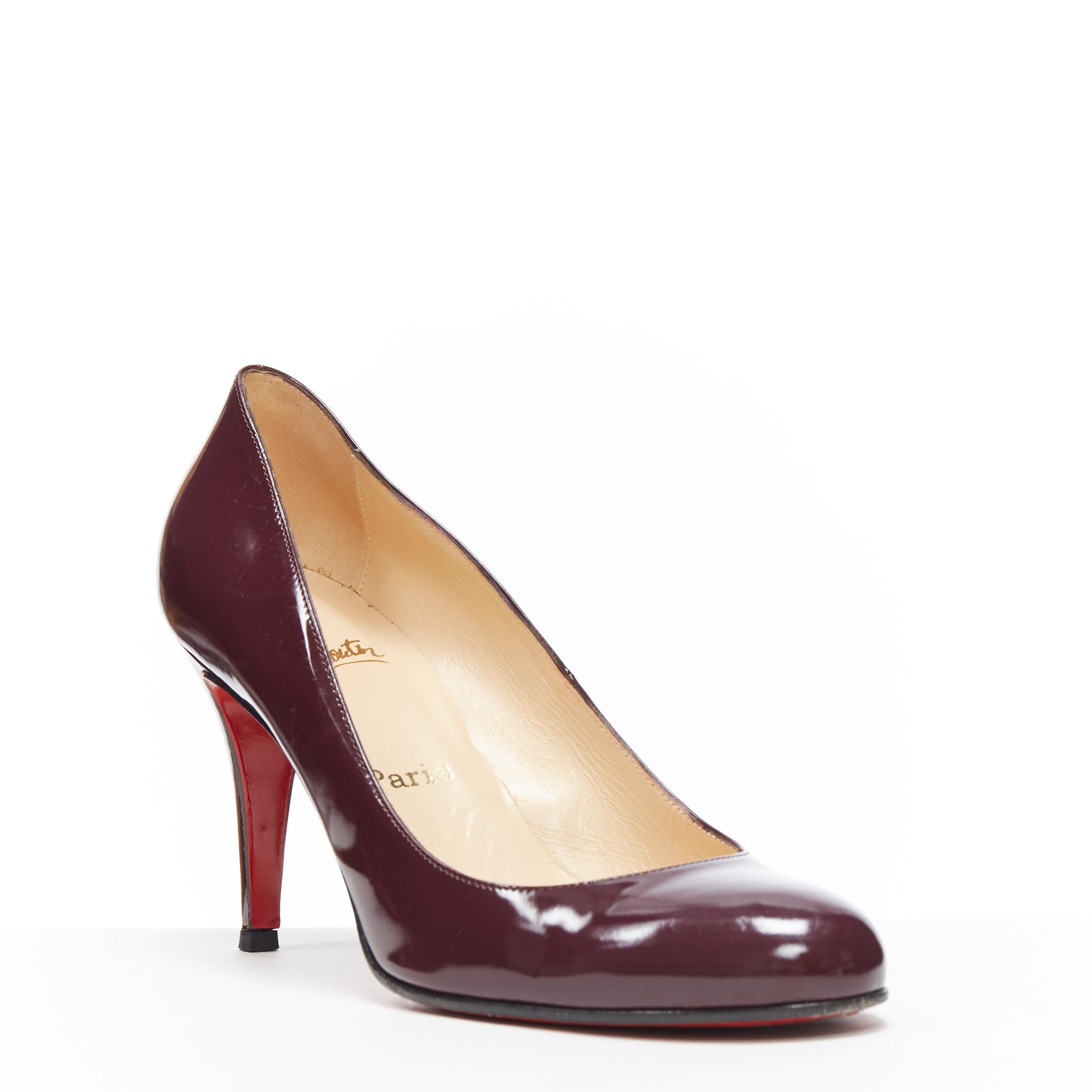 CHRISTIAN LOUBOUTIN Ron Ron 85 purple patent calf round toe high heel EU39.5 
Brand: Christian Louboutin
Designer: Christian Louboutin
Model Name / Style: Ron ron 85
Material: Patent leather
Color: Purple
Pattern: Solid
Extra Detail: Round toe.