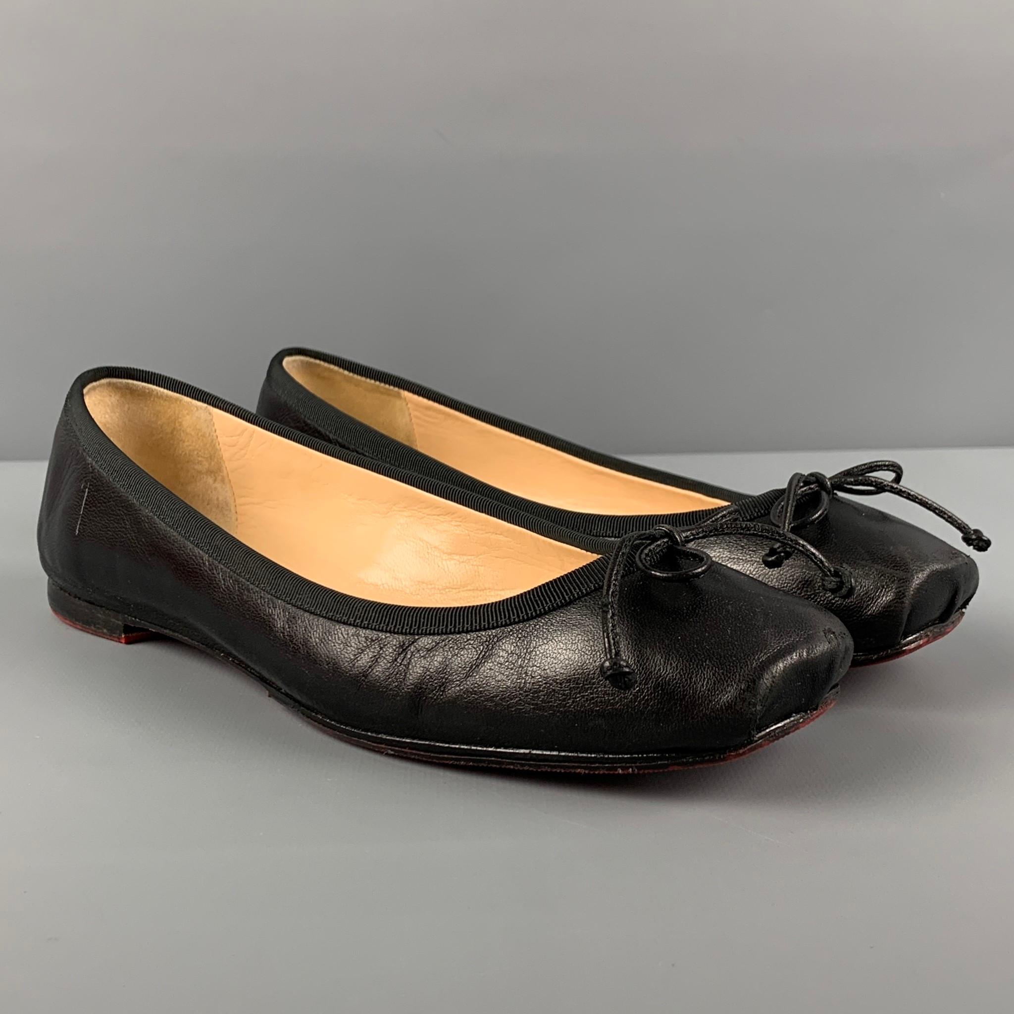 CHRISTIAN LOUBOUTIN 'Rosella' flats comes in a black leather featuring a ribbon trim, front bow detail, and signature red sole. Includes box. Made in Italy. 

Good Pre-Owned Condition. Minor wear. As-Is.
Marked: 37

Outsole: 9.5 in. x 3 in. 