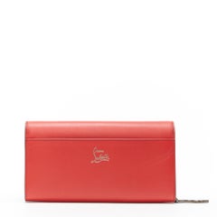 CHRISTIAN LOUBOUTIN Rougissime Rotes Leder Portemonnaie mit Klappe und Riemen Clutch Bag
