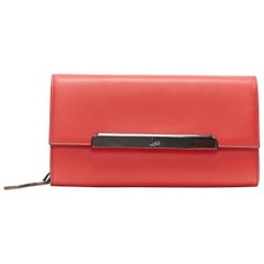 CHRISTIAN LOUBOUTIN Rougissime red leather flap wallet on strap clutch bag