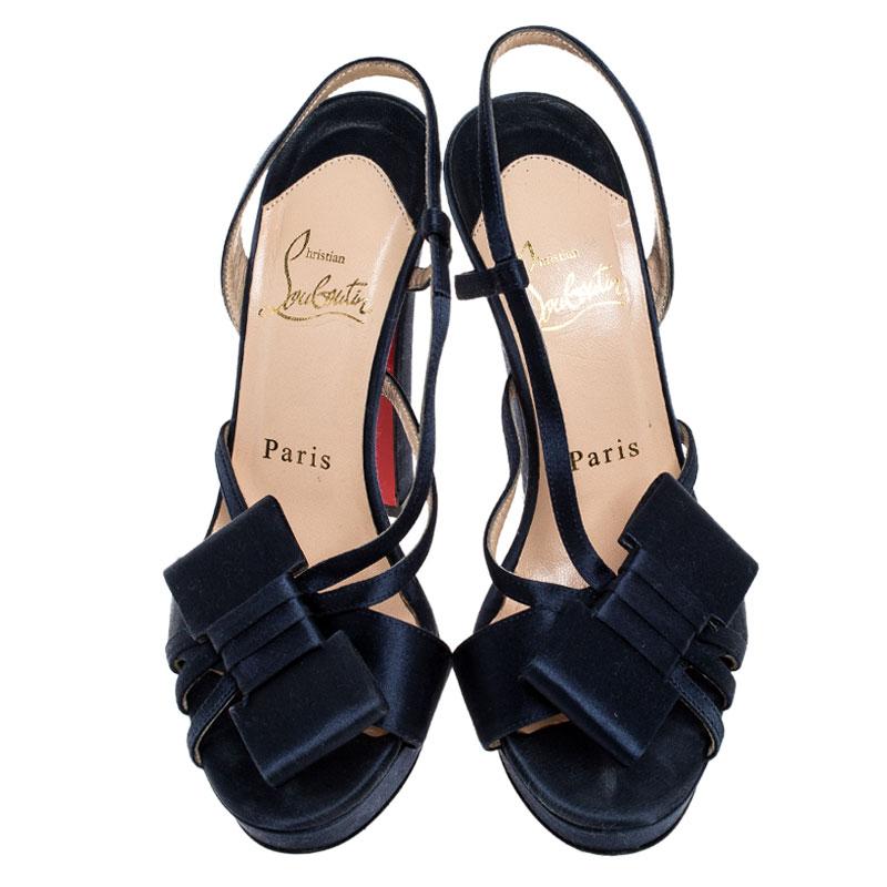 Wear these stylish sandals from the house of Christian Louboutin and channel your inner fashionista. These satin sandals will make you look confident and uber-stylish. Set on 13.5 cm heels and platforms, these sandals are tailored to offer you