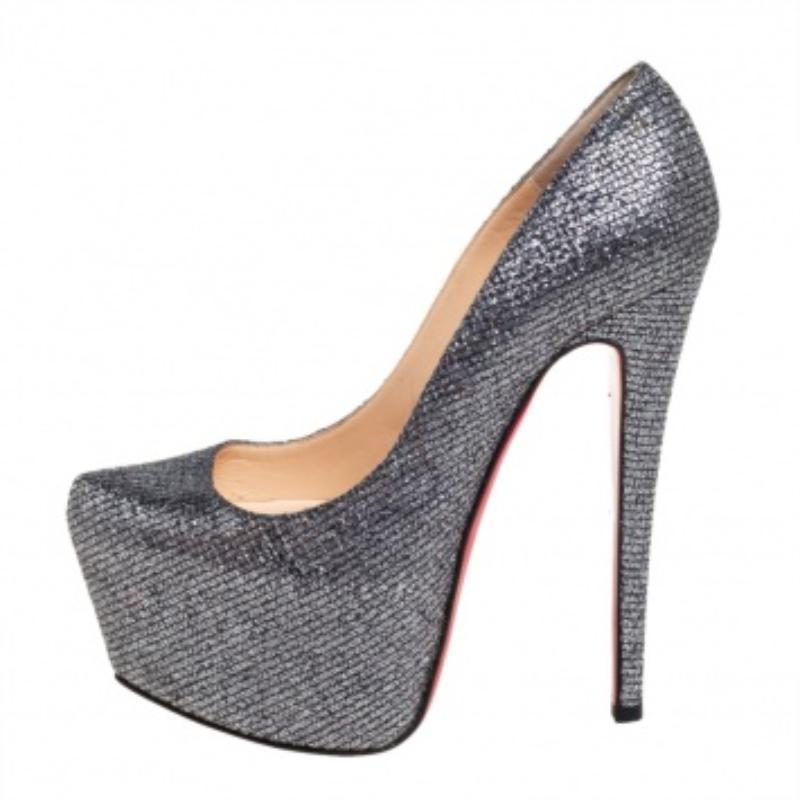 Take your love for Louboutins to new heights by adding this gorgeous pair to your collection. The pumps simply speak high fashion in every stitch and curve. The exteriors come made from glitter and the silver pumps are finished with platforms, 15 cm