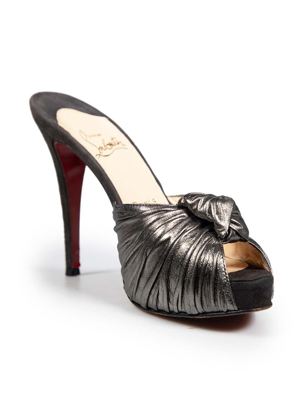 CONDITION is Very good. Minimal wear to the heels is evident. Minimal wear to the front of both in soles. Discolouration to the left side of the right shoe. Creasing to the heel tip on both shoes of this used Christian Louboutin designer resale
