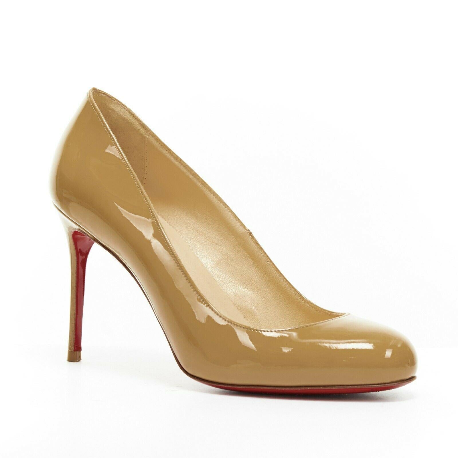 CHRISTIAN LOUBOUTIN Simple 85 nude patent leather round toe slim heel pump EU37
CHRISTIAN LOUBOUTIN
Simple 85. Nude patent leather upper. 
Round toe. Tonal stitching. Slim stiletto heel. Padded tan leather lining. 
Signature Christian Louboutin red