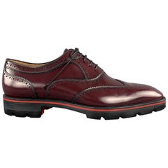 CHRISTIAN LOUBOUTIN Size 12 Burgundy Perforated Leather Wingtip Lace Up Shoes