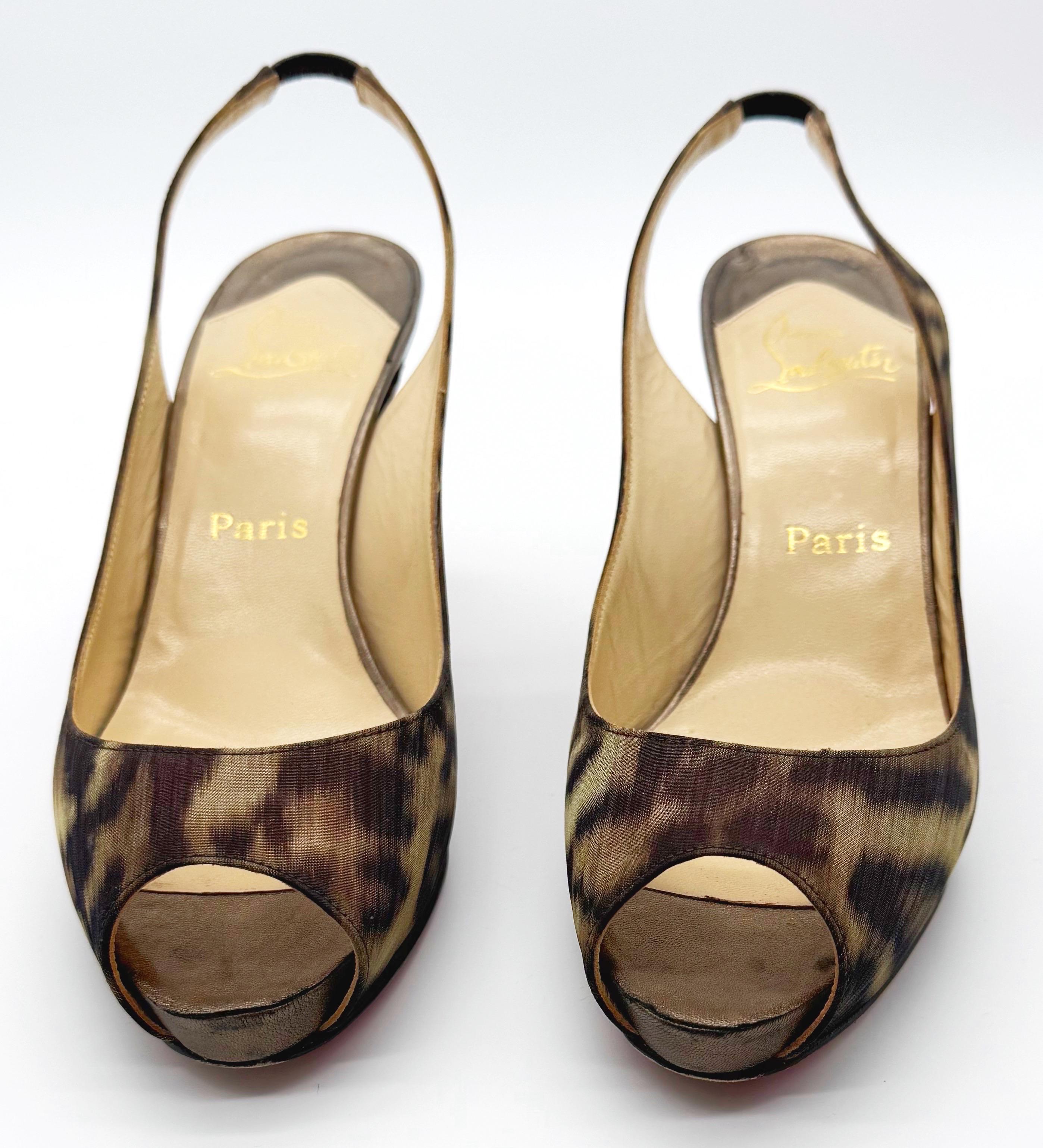 Amazing Christian Louboutin early 2000s Y2K leopard / cheetah print slingback heels ! Bronze heel with signature red bottoms. Pair with jeans, shorts, a skirt or a dress.
In good condition with minor wear. 
Marked Size 39 / US 9