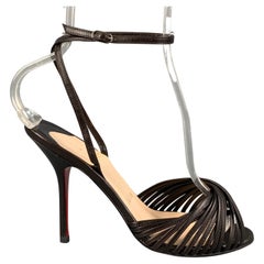 CHRISTIAN LOUBOUTIN Größe 7 Braune Ledersandalen mit Knöchelriemen