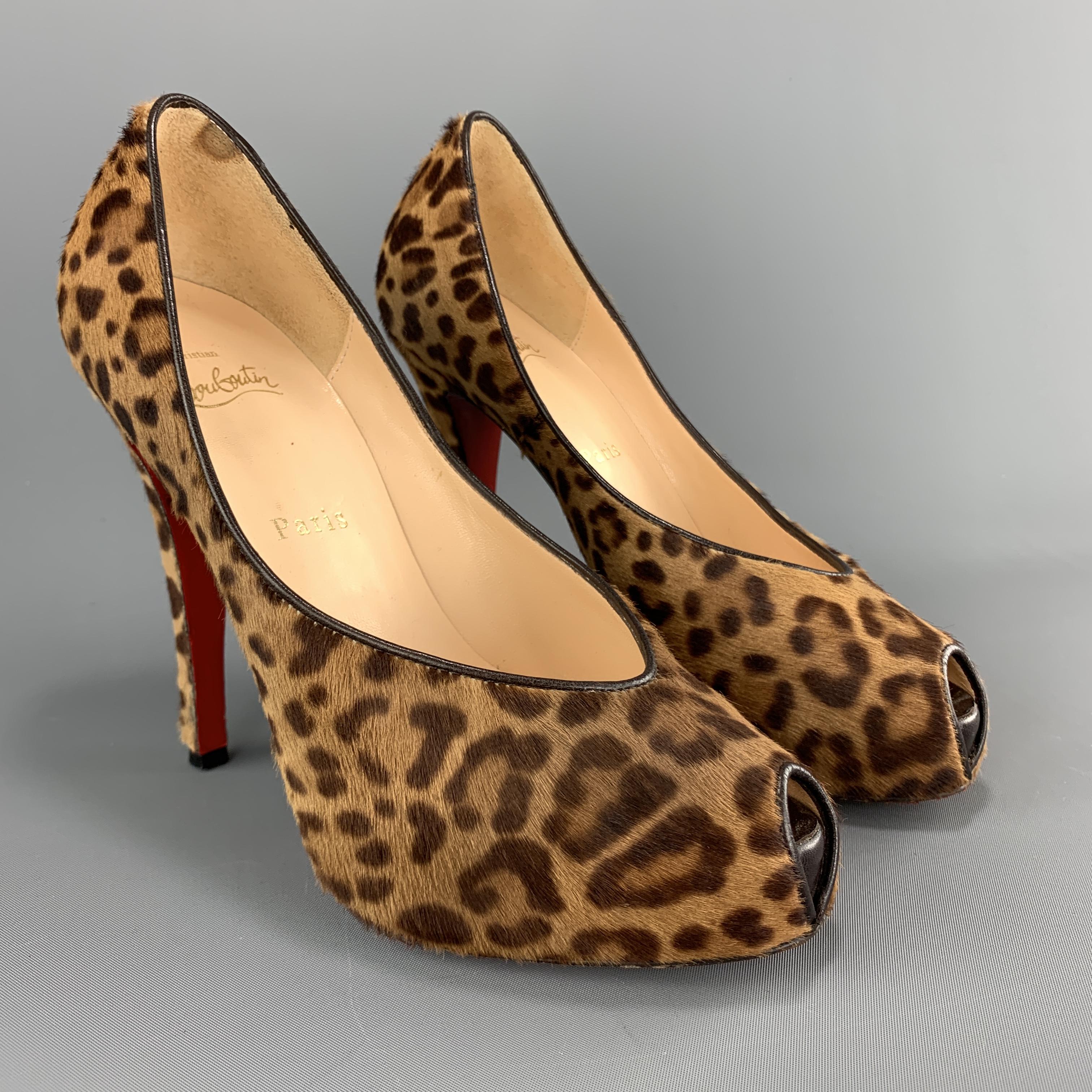 CHRISTIAN LOUBOUTIN pumps come in leopard print ponyhair with a peep toe and covered platform. Made in Italy.

Very Good Pre-Owned Condition.
Marked: IT 37

Measurements:

Heel: 4.5 in.
Platform: 1 in.