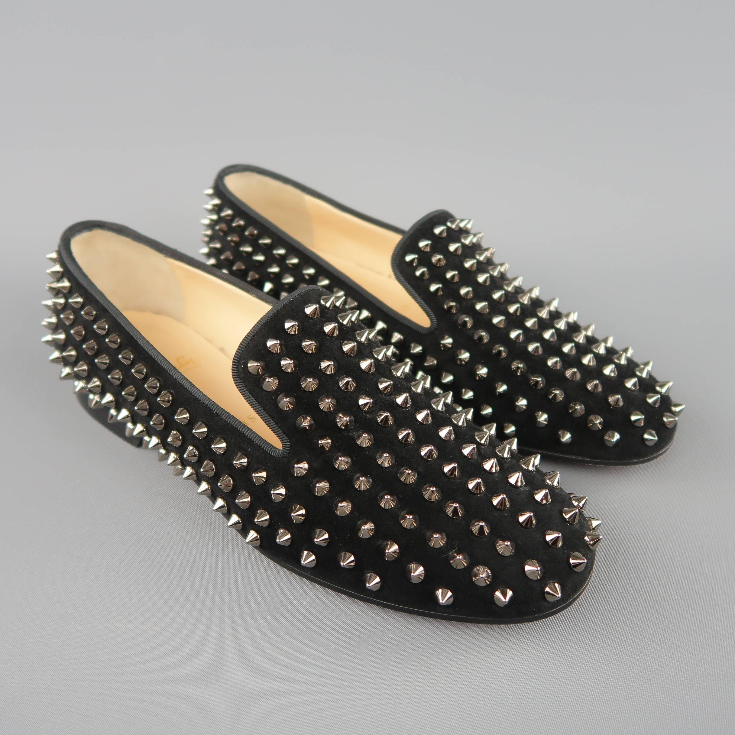 CHRISTIAN LOUBOUTIN loafers come in black suede with faille piping, red sole, and silver tone spikes throughout. Worn once. With dust bags and box. Made in Italy.
 
Excellent Pre-Owned Condition.
Marked: IT 38
 
Outsole: 9.75 x 3.5 in.
