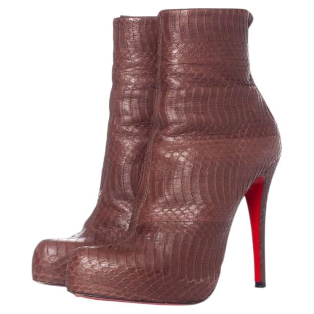 Christian Louboutin, bottes à plateforme en peau de serpent