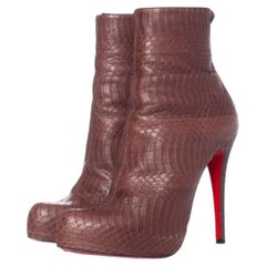 Christian Louboutin, bottes à plateforme en peau de serpent