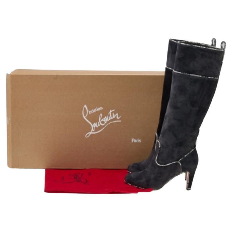 Adding a sleek pair of knee-high boots to your collection gets you ready to create those stylish and special looks in the winters with ease. These Christian Louboutin boots feature a suede and snakeskin exterior and are almond-toes and sturdy heels.