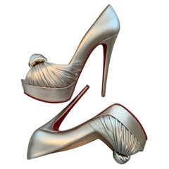 CHRISTIAN LOUBOUTIN Soft Gold Leather Knotted Pumps