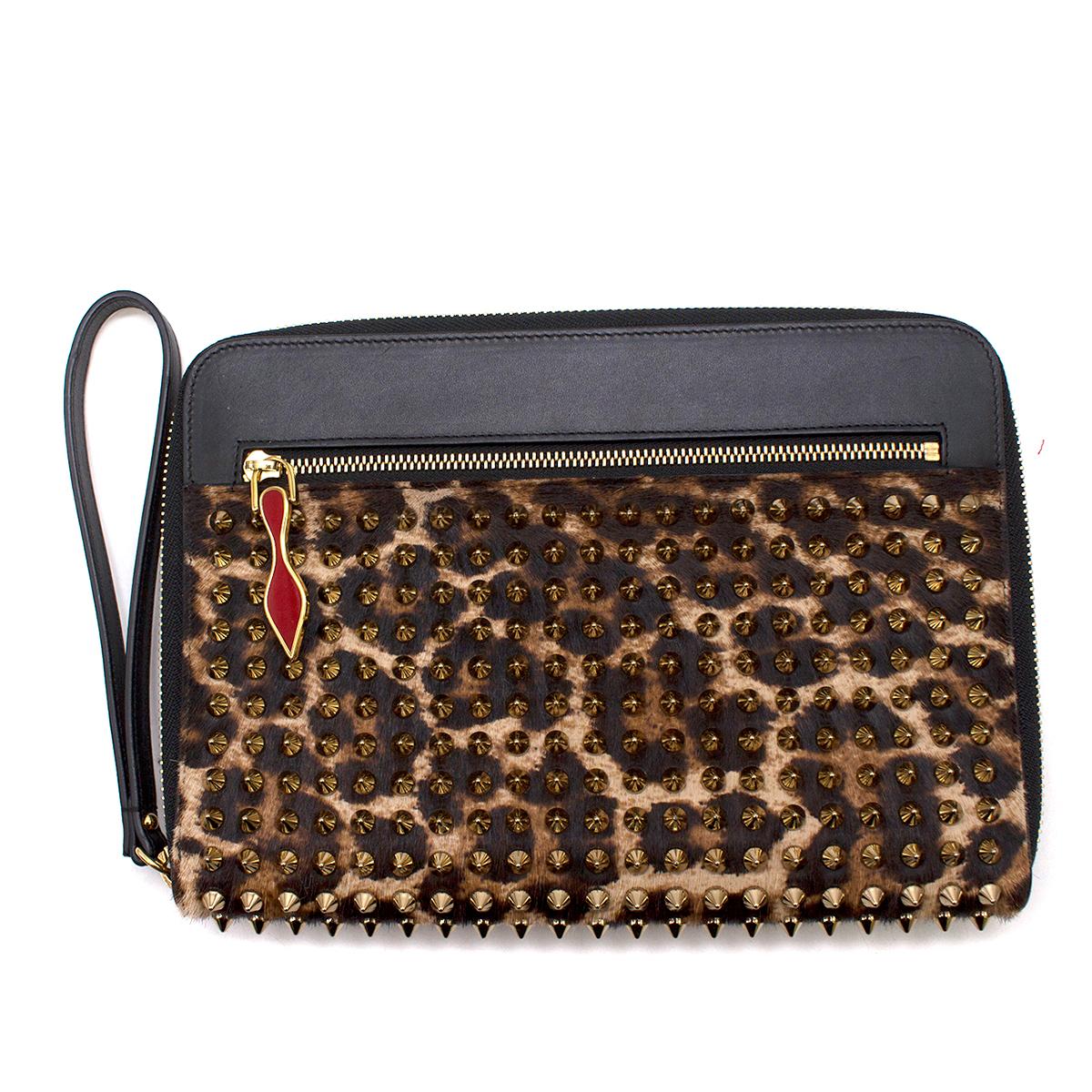 Christian Louboutin Spike document holder

- Tonal-brown leopard print, calf hair 
- Black smooth leather front panel 
- Gold-tone metal spike embellished 
- front zip-fastening pocket, signature red lacquered shoe zip pull
- Zip around closure,