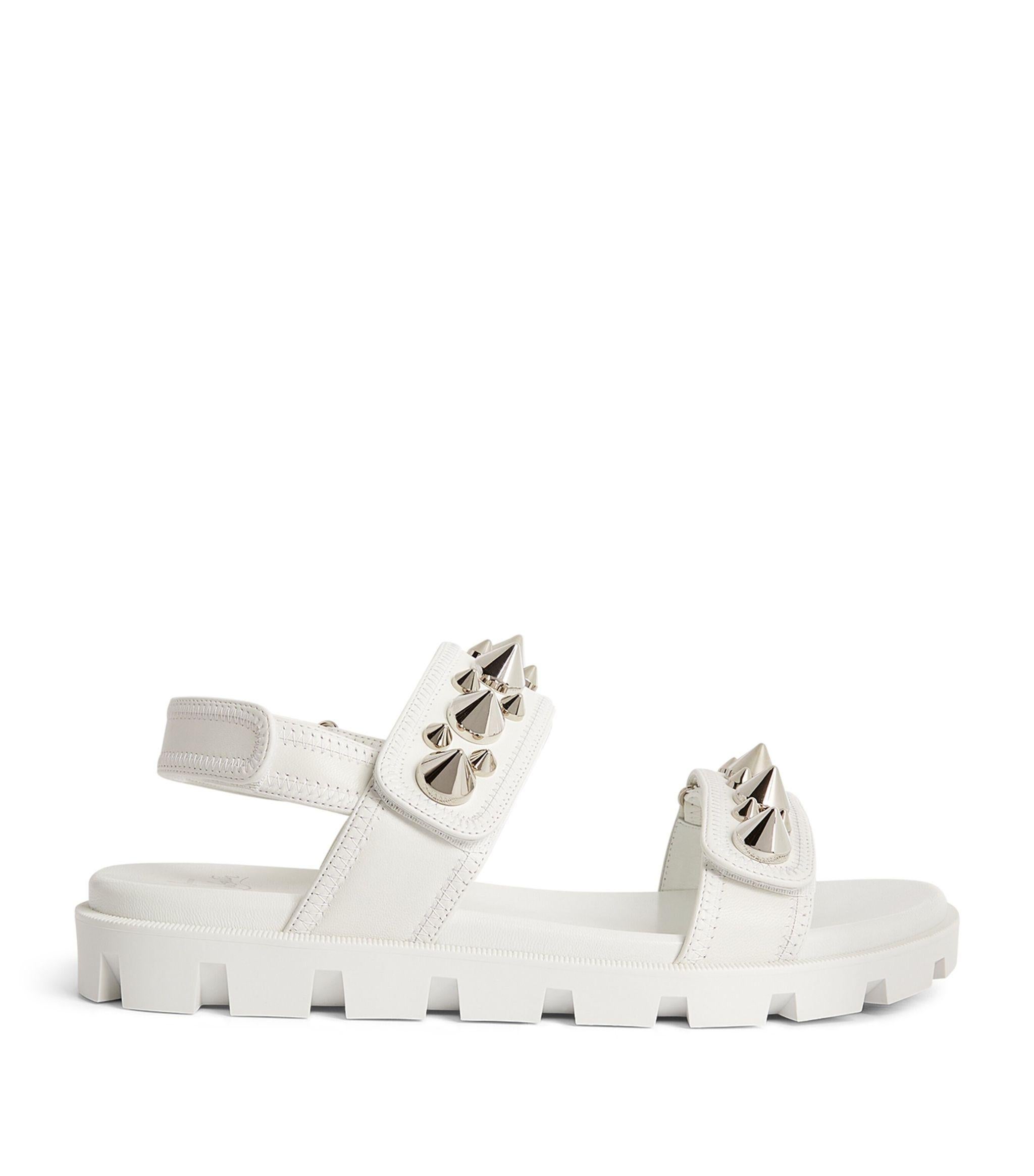 Christian Louboutin has evolved the chunky sneaker into a summer-ready sandal to ensure your footwear edit transcends seamlessly into the new season. The Spikita Cool velcro sandals make the perfect canvas for the brand's signature silver spikes,