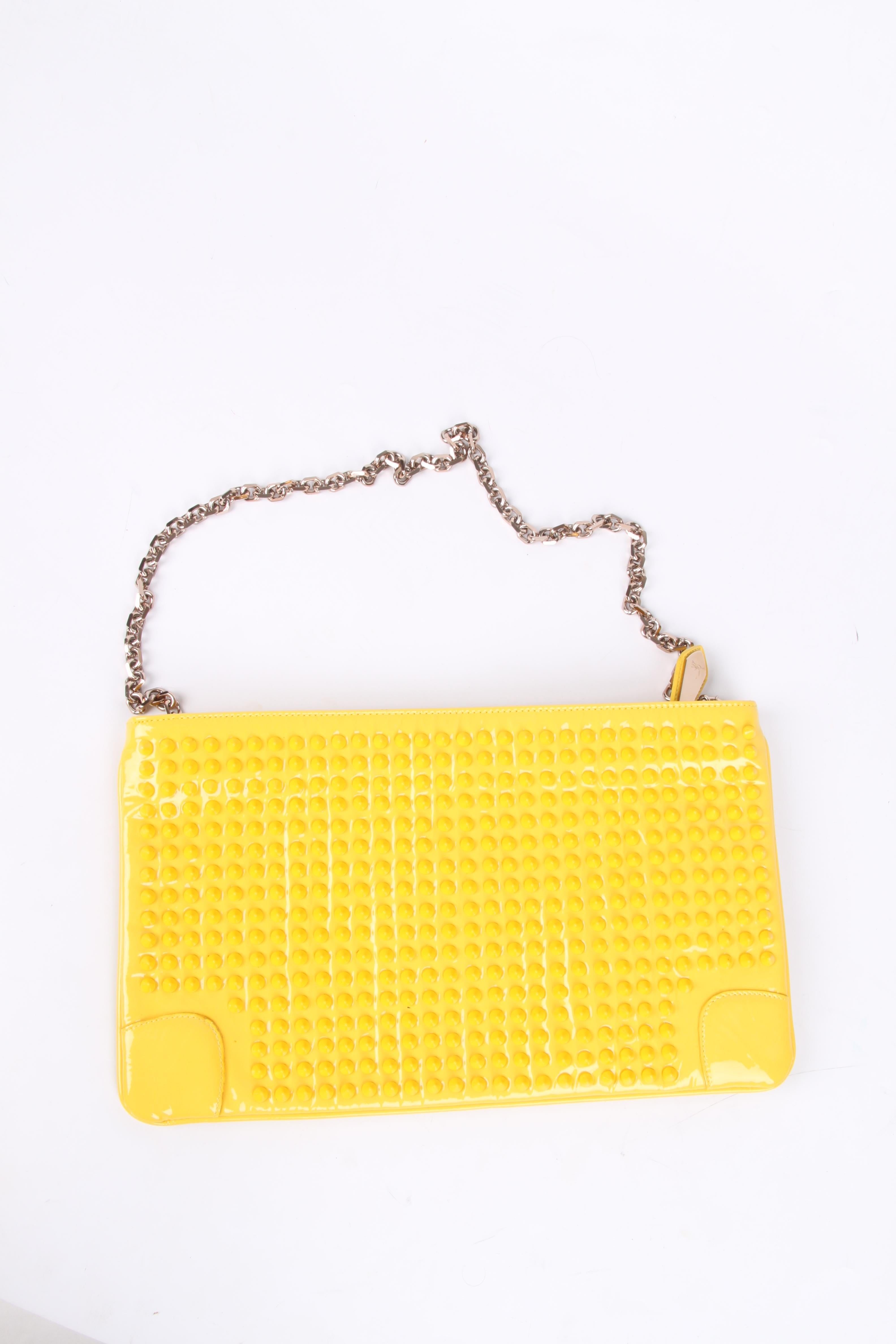 Christian Louboutin Studded Clutch - yellow In Excellent Condition In Baarn, NL