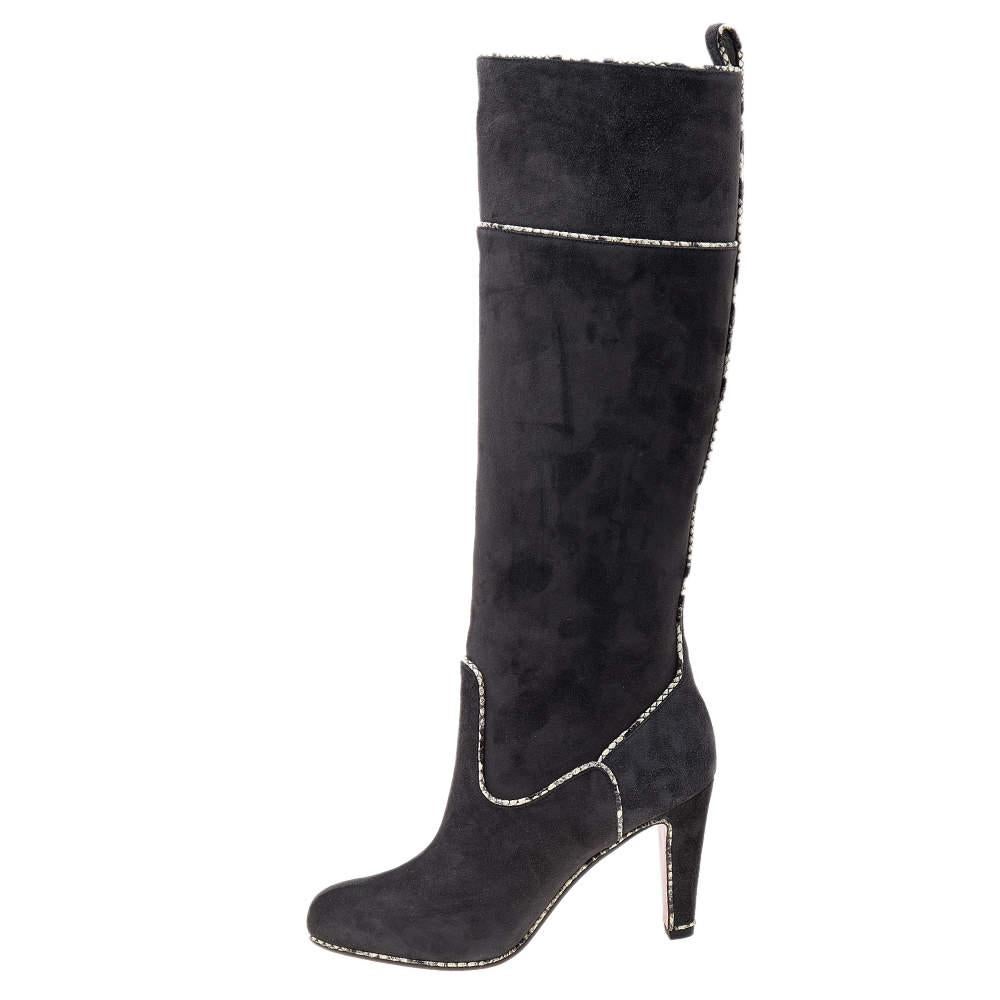 Adding a sleek pair of knee-high boots to your collection gets you ready to create those stylish and special looks in the winters with ease. These Christian Louboutin boots feature a suede and snakeskin exterior and are almond-toes and sturdy