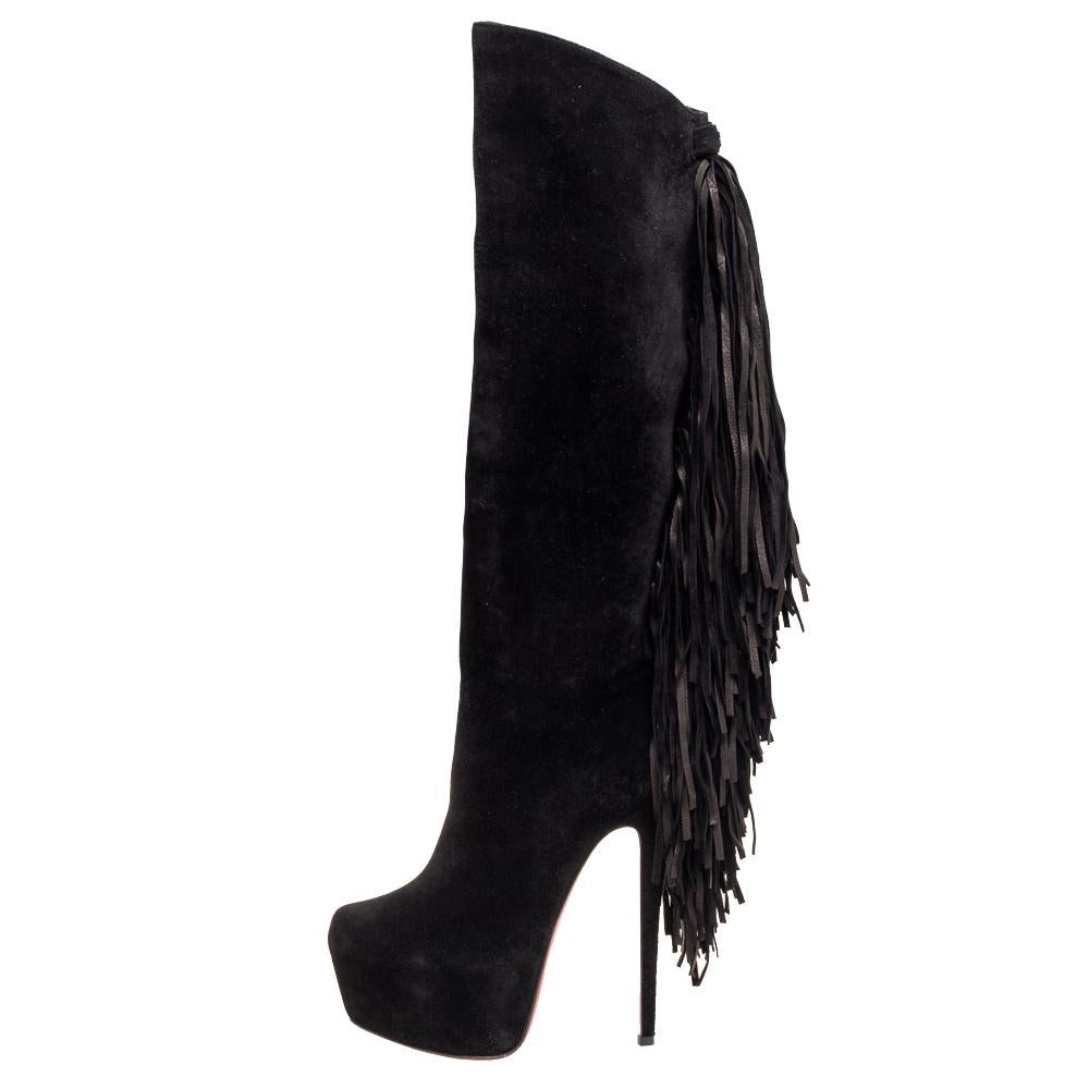 Simple and sophisticated, these Interlopa boots from the House of Christian Louboutin are a must-buy for the fashionable you. They are designed using black suede into a knee-length silhouette. They feature fringe detailing, platforms, and slim heels