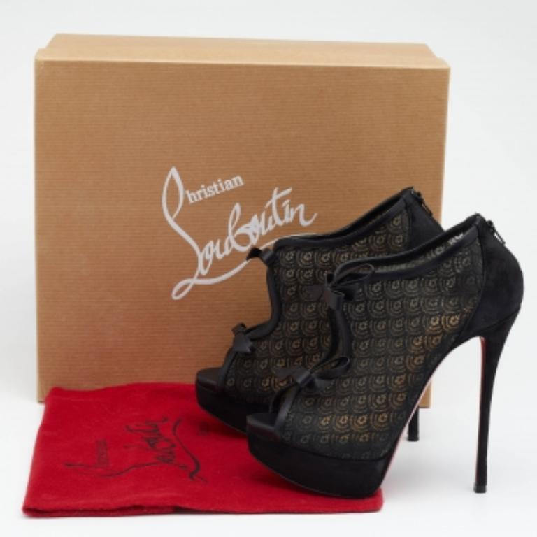A pair of suede and mesh booties are just what you need to make a lasting impression. This awestruck beauty by Christian Louboutin features 14cm heels, platforms, and bow detailing at the front. Designed into an open-toe silhouette, these shoes come