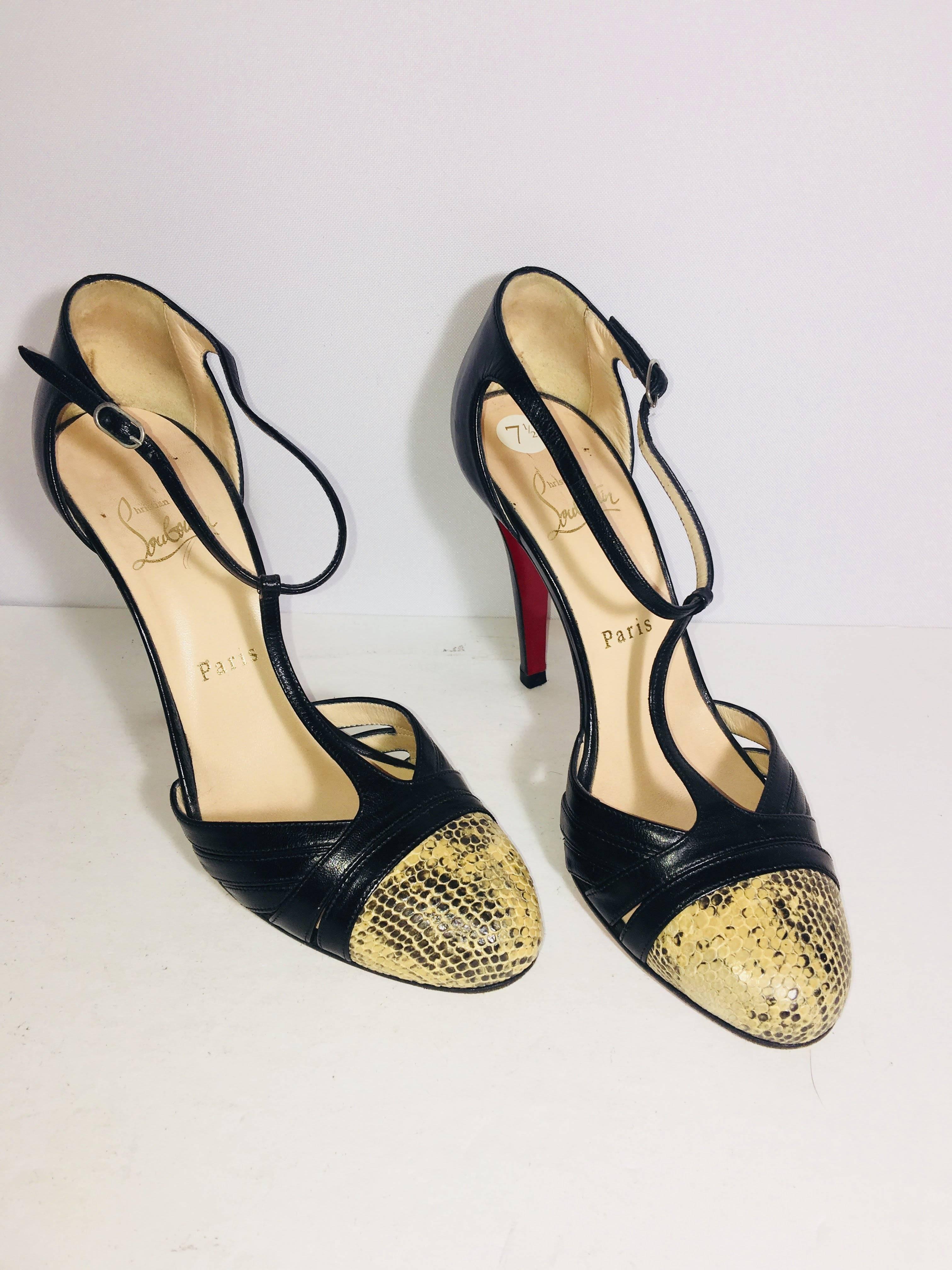 Christian Louboutin T-Strap Pumps with Closed Toe and Snake Print Detail.