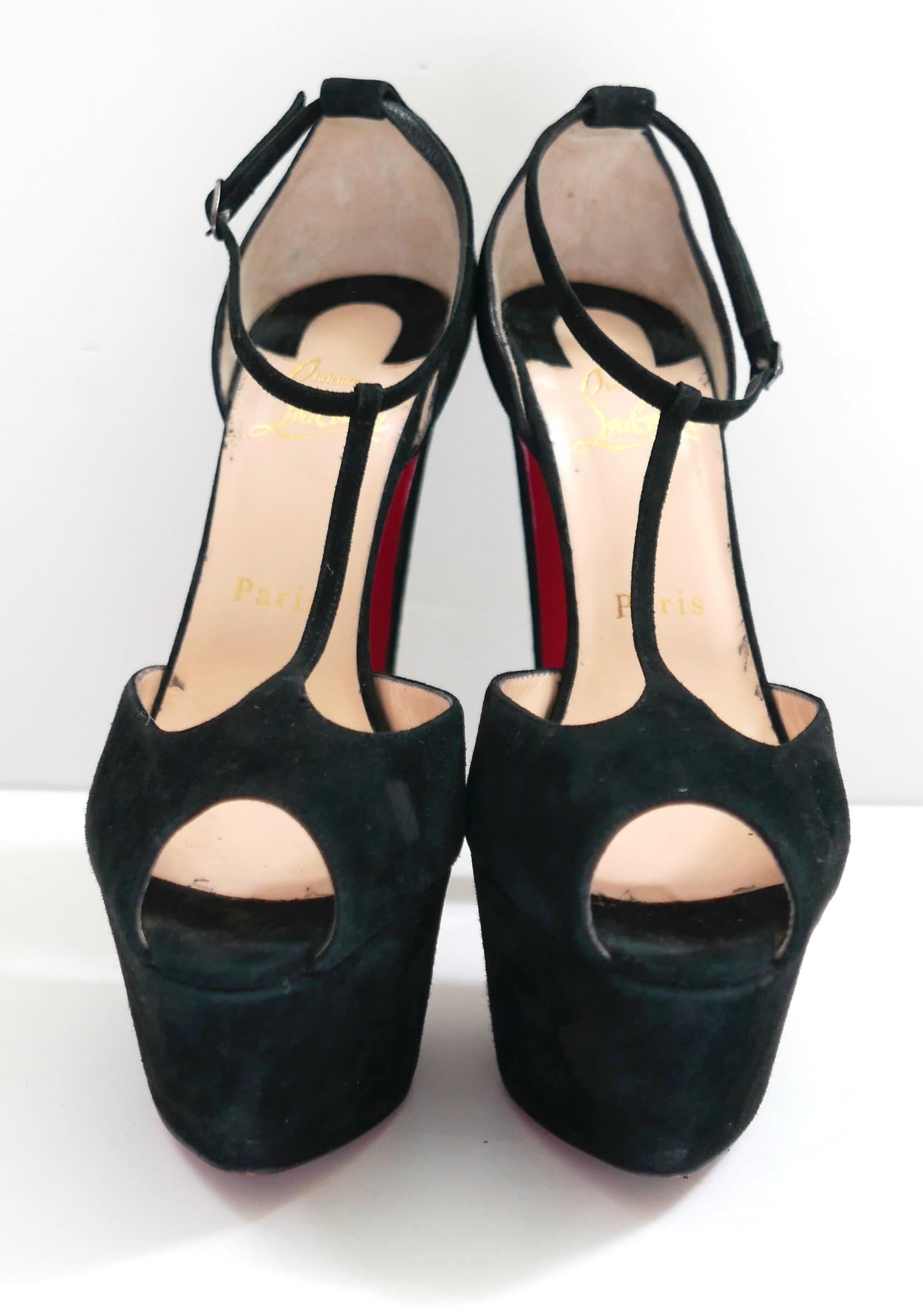 Party ready, 1970s inspired Christian Louboutin Talitha Suede T-Strap platforms. Bought for £950 and worn twice. Come with 1 x dustbag. Made from smooth black suede, they have deep platforms, towering heels and t-strap fronts with ankle buckles.