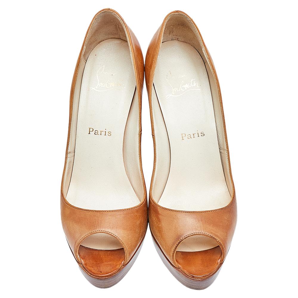 Christian Louboutin's timeless aesthetic and stellar craftsmanship in shoemaking is evident in these versatile pumps. Crafted from tan leather, the silhouette is adorned with peep-toes and is raised on heels supported by platforms.

Includes: