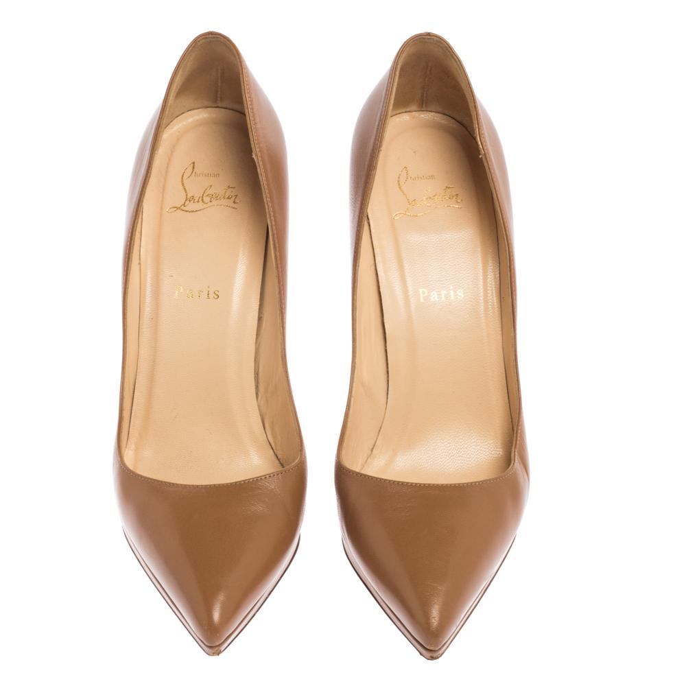 Louboutins are designed to lift one's attitude and outfit. Let this pair lift yours as well by owning them today. Crafted from leather, these tan Pigalle Plato pumps carry pointed toes and sleek heels.

