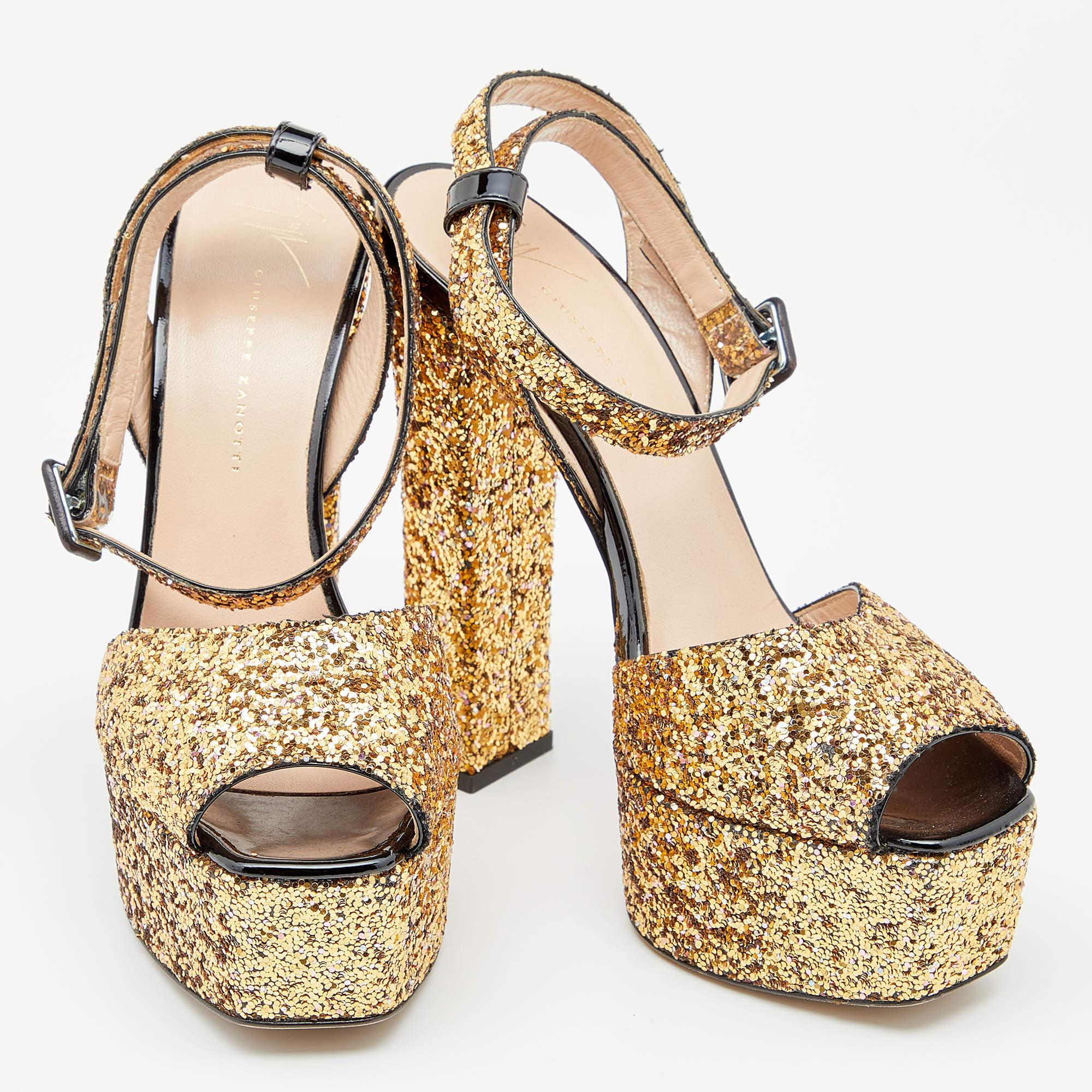 Let your ensemble stand out and make you shine as you wear these stunning sandals from Giuseppe Zanotti. They are brilliantly designed using gold coarse glitter on the exterior, granting them an ultra-luxurious look. Additionally, their sturdy shape