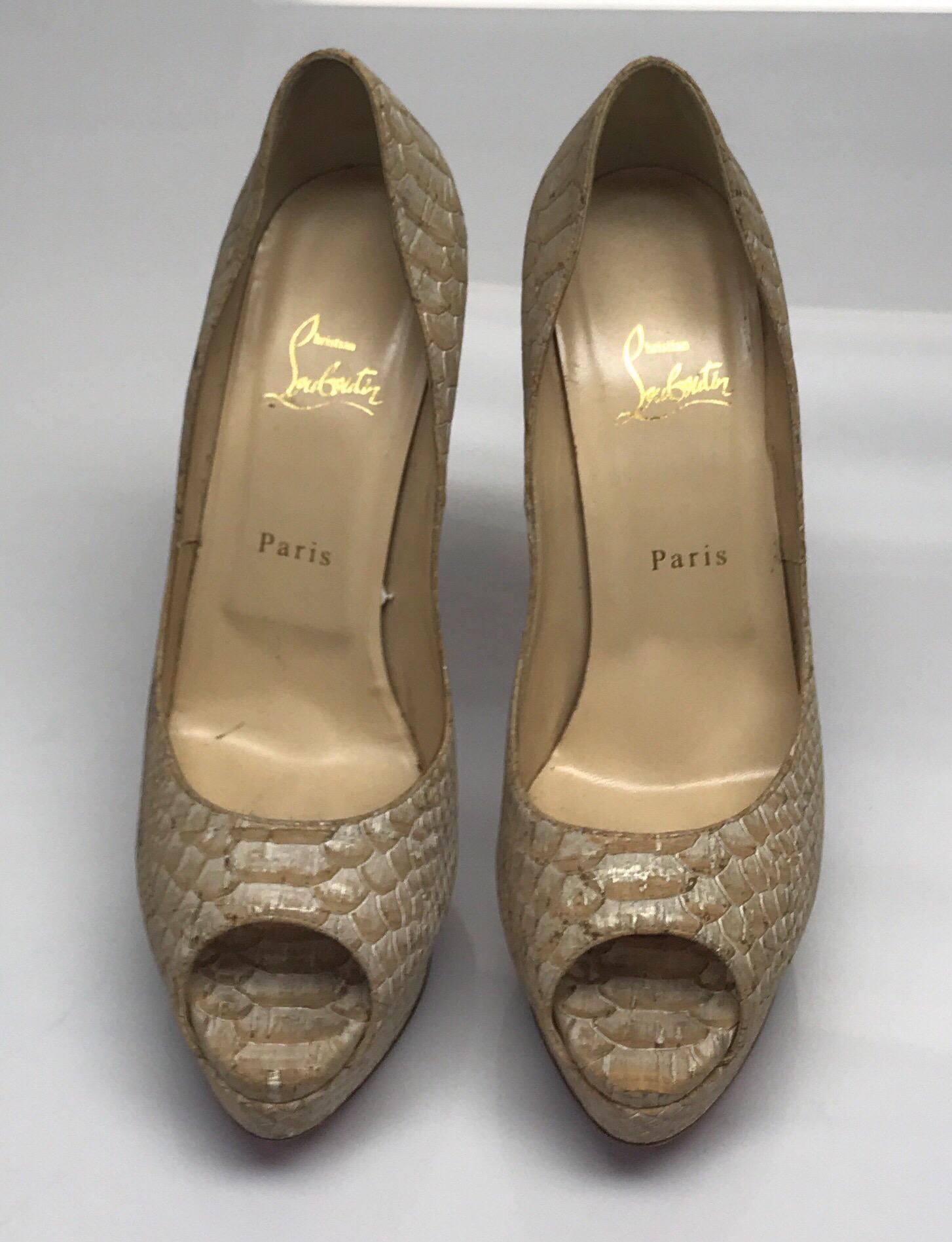 Christian Louboutin Tan & Metallic Snake Platform Peep toe Pumps - 41. These stunning Christian Louboutin pumps are in good condition, they show minor wear to the bottom of the shoe where some of the red has rubbed away. They are made of tan