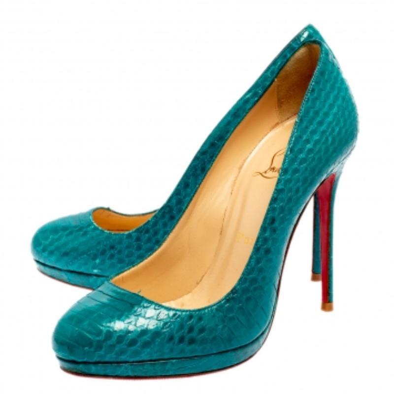 Louboutins are designed to lift one's attitude and outfit. Let this pair lift yours as well by owning them today. Crafted from python leather, these turquoise blue pumps carry covered toes and a sleek silhouette. Completed with 11 cm heels and the