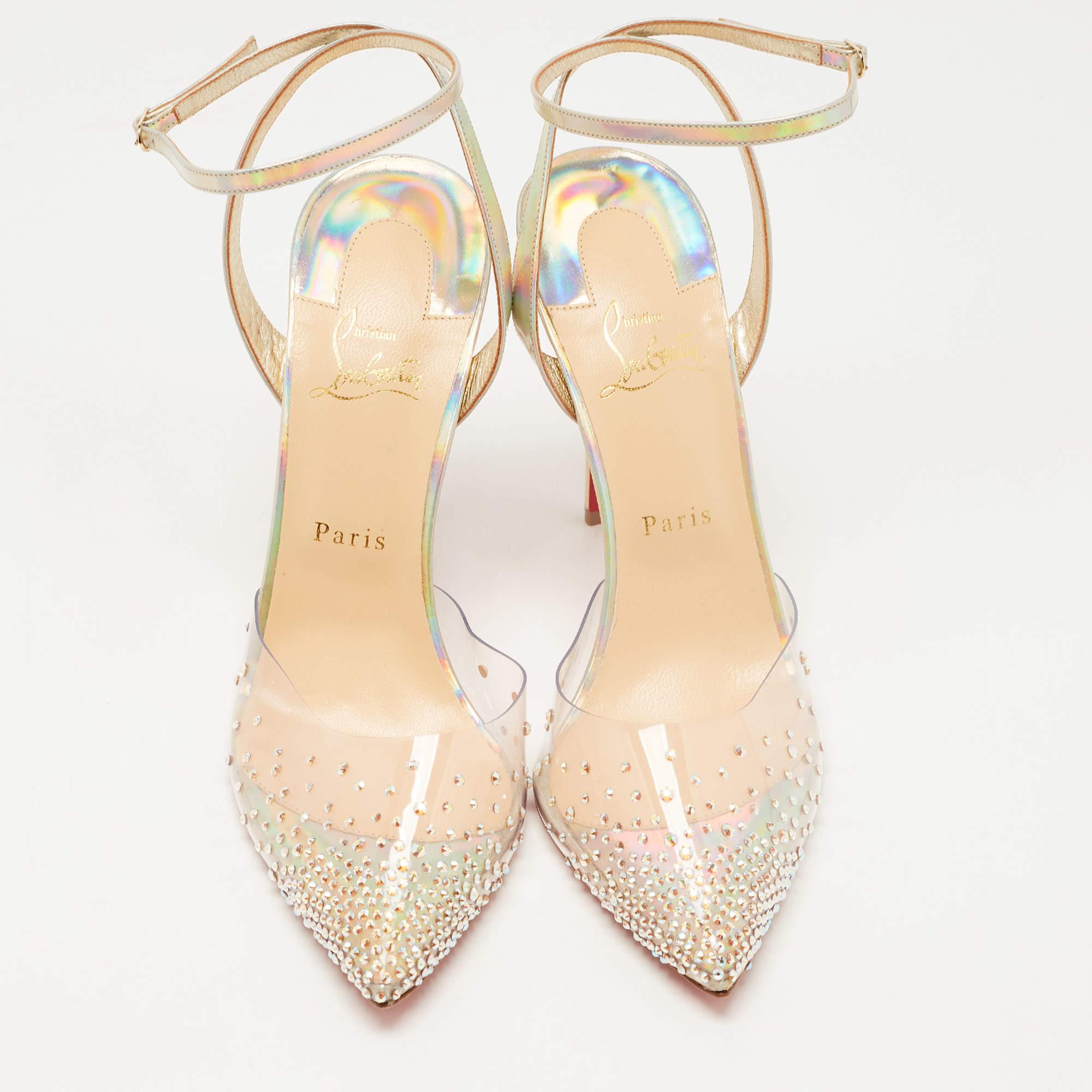 Create the most eye-catching party looks by wearing these Christian Louboutin pumps. Constructed from iridescent leather and clear PVC, these pointed-toe pumps feature buckled straps around the ankles, slim heels, and studs embellished on the toes.

