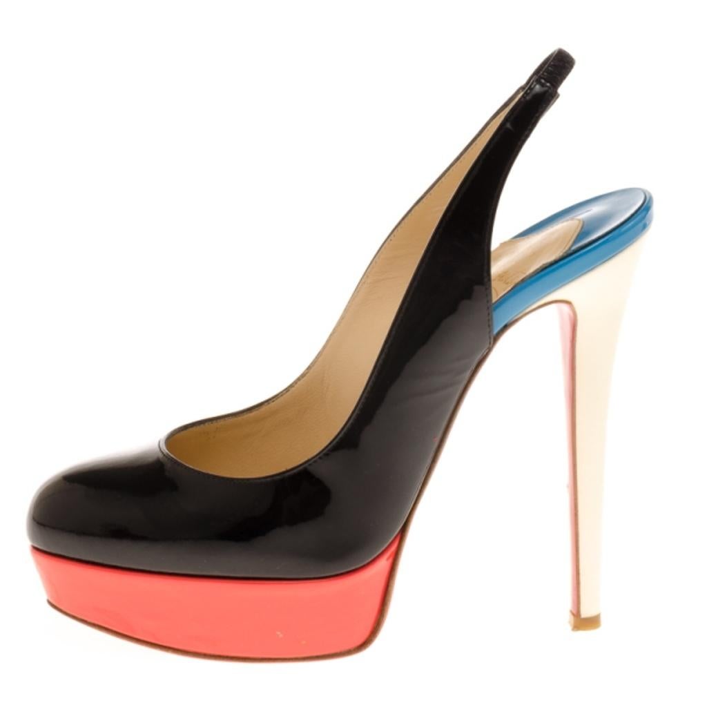 Christian Louboutin heels are every girl's dream. These funky color-blocked platforms add a pop of color to your outfit. Combining pink platforms, black toe boxes, white heels, and blue linings, their colorful look is versatile and can be matched