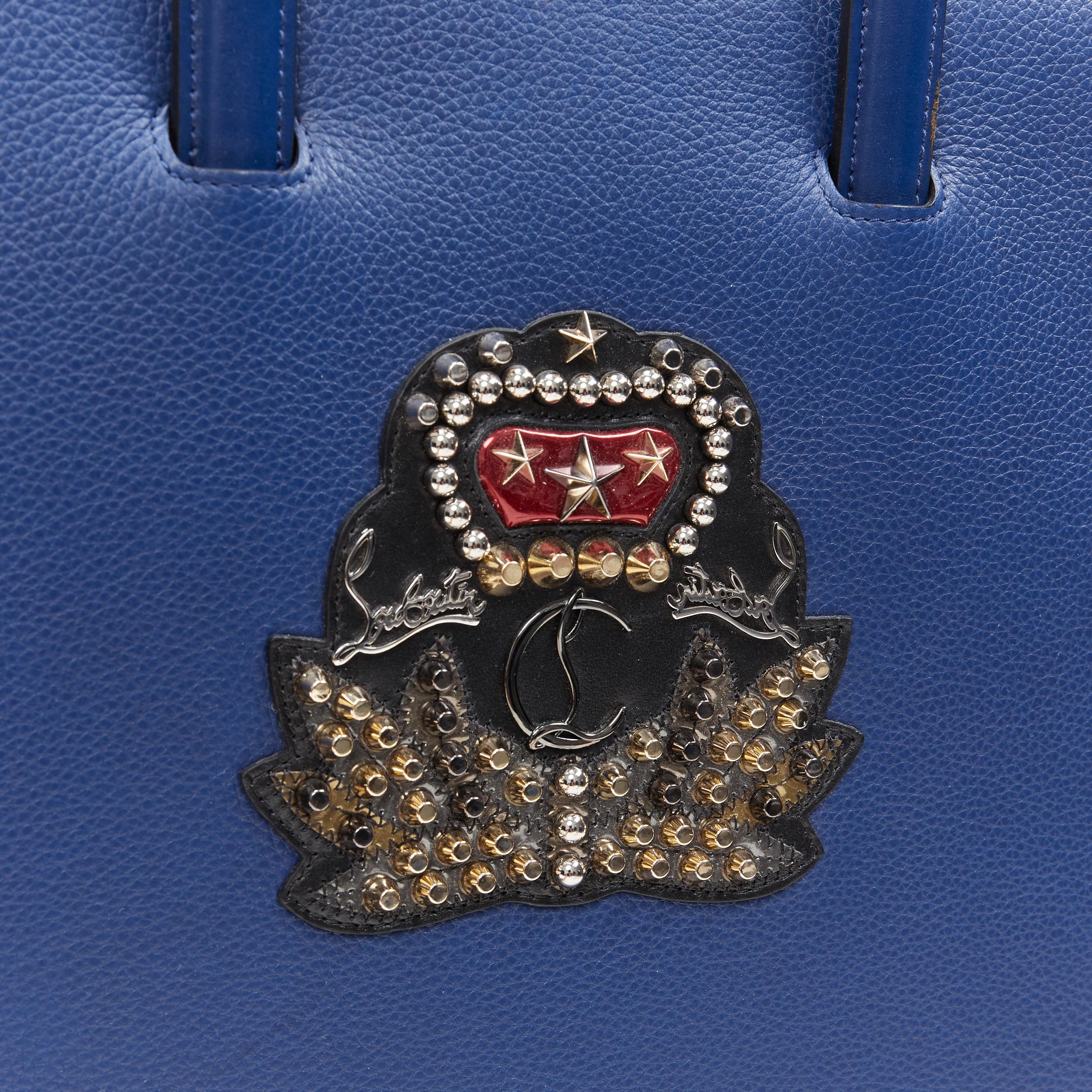Women's CHRISTIAN LOUBOUTIN Trictrac blue crest studded leather side zip portfolio bag For Sale
